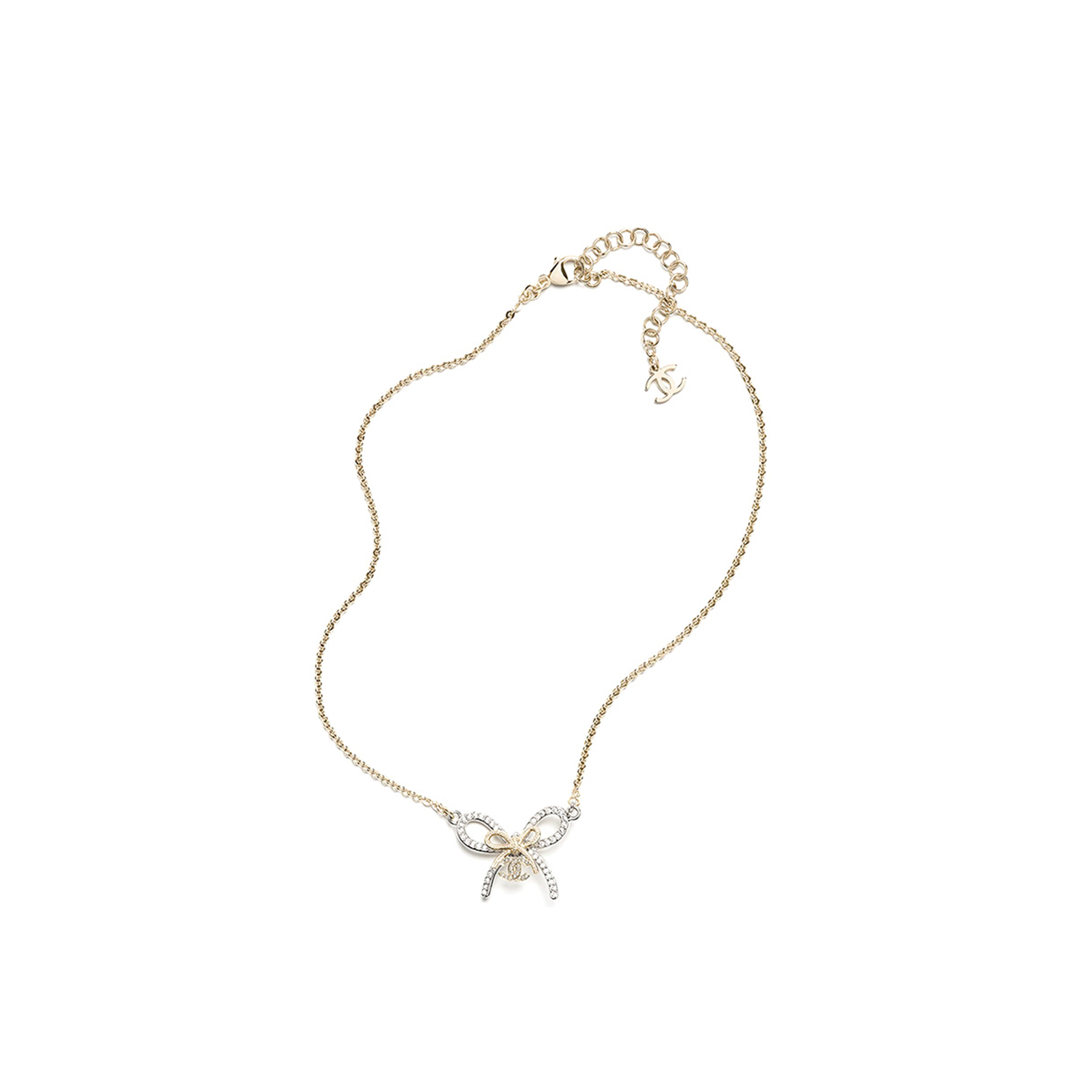 CHANEL PENDANT NECKLACE METAL & DIAMANTÉS SILVER, GOLD & CRYSTAL ABG588